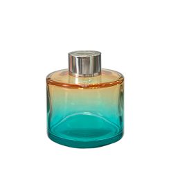 Okrągły dyfuzor zapachowy w kolorze pomarańczowo niebieskiego ombre