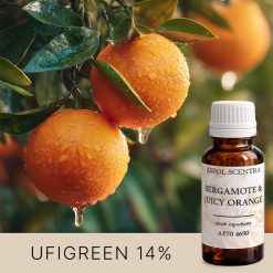 Pomarańcza z rosą i przekrojem na drzewie.