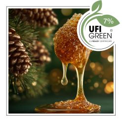 Miód spływający na sosnowe igły.