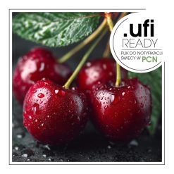 Trzy mokre wiśnie z liściem na ciemnym tle.