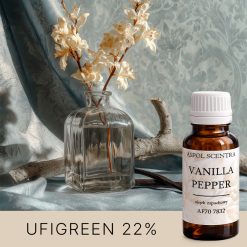 Wanilia, kwiat i flakonik perfum na tle satyny.